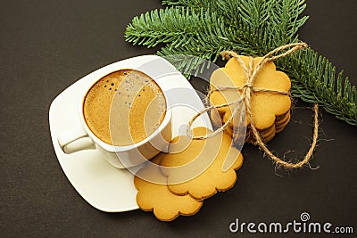 Cup of coffee with milk crema and ginger cookies, Christmas morning, top view Stock Photo