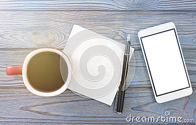 Cup of coffee, napkin, pen, smartphone phone Stock Photo