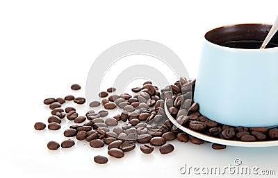 A cup of coffee and scattered coffee beans on white background Stock Photo