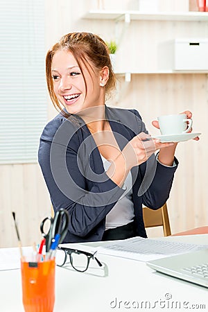 A cup of coffee to feel good during working hours Stock Photo