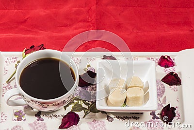 Cup of coffee and turkish special dessert badem ezmesi Stock Photo