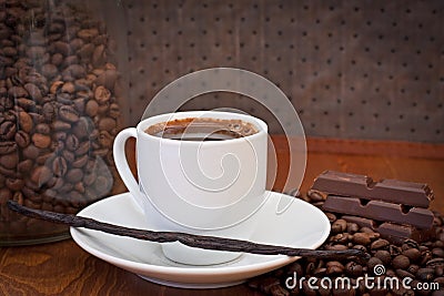 Cup of coffee, vanilla bean and chocolate Stock Photo