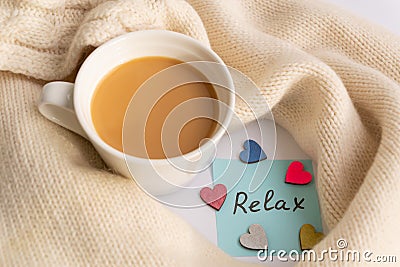 Cup of coffee with warm plaid. Winter or autumn mood concept Stock Photo