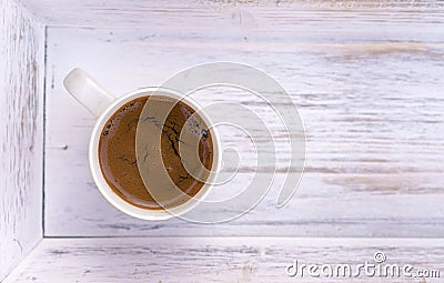 Cup of coffee on white wooden salver Stock Photo