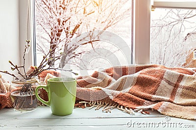 Cup of coffee on the window sill Stock Photo