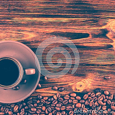 A cup of coffee on a wooden background. Stock Photo