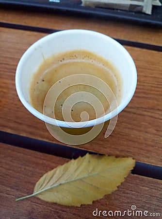 Cup of coffee on wooden table Stock Photo