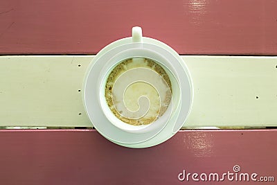 Cup of coffee on wooden table Stock Photo