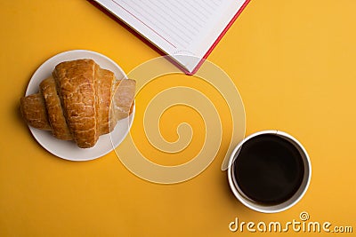 Cup of coffee on yellow background Stock Photo