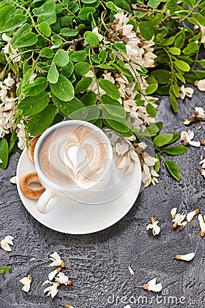 Cup of coffeel and acacia closeup Stock Photo