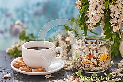 Cup of coffeel and acacia closeup. Stock Photo