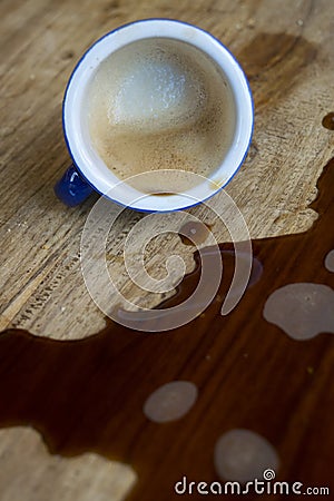 Espresso coffee spilt on table Stock Photo