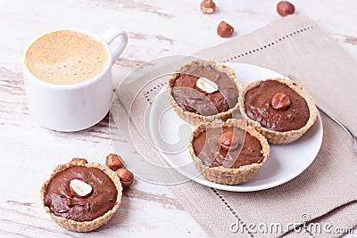 Cup of espresso, milk and cakes, close up, horizontal Stock Photo