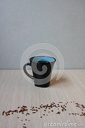 Cup of fresh coffee on light background with grain powder coffee Stock Photo