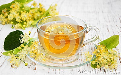 Cup of herbal tea with linden flowers Stock Photo