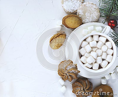 Cup of hot chocolate and assorted cookies: linzer cookies,shortbread, orange almond cookies Stock Photo
