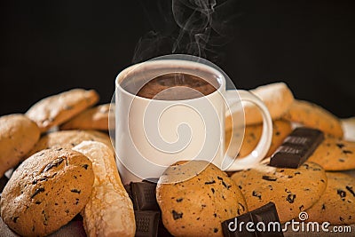 Cup of hot chocolate with cookies and ounces of chocolate Stock Photo