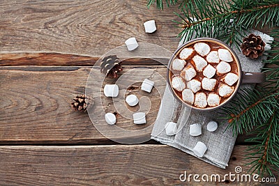Cup of hot chocolate on wooden rustic table from above. Delicious winter drink. Flat lay. Stock Photo