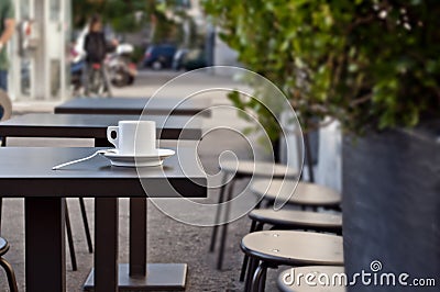 Cup of italian espresso on a table - street cafe Stock Photo