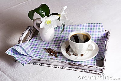 Cup of morning coffee with white flowers Stock Photo