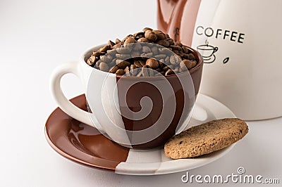 Cup of roasted brown coffee beans Stock Photo