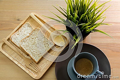 Cup soup with bread breakfast on the wood table Stock Photo