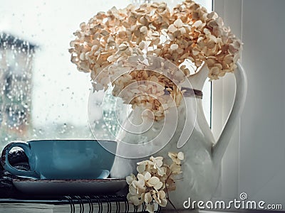 Cup of strong coffee, bouquet of beautiful flowers Stock Photo