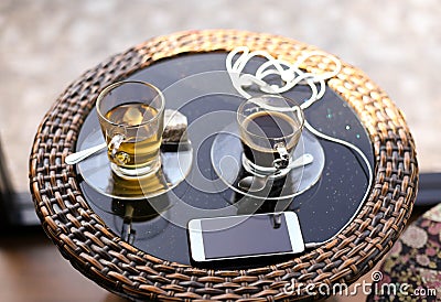 Cup of tea and coffee and cell phone Stock Photo