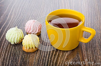 Cup of tea and cookies with souffle and coconut flakes Stock Photo