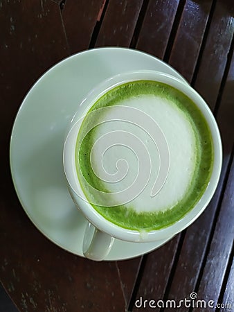 A cup of tea green white milk good taste clean food thailand Stock Photo
