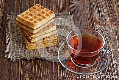 Cup of tea and stack of waffles Stock Photo