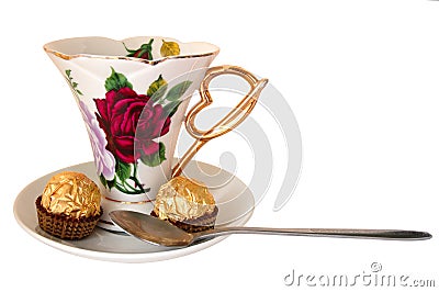 Cup of tea and sweeties. Stock Photo