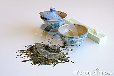 Cup of tea with tea leaves Stock Photo