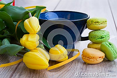 Cup of tea with tulips Stock Photo