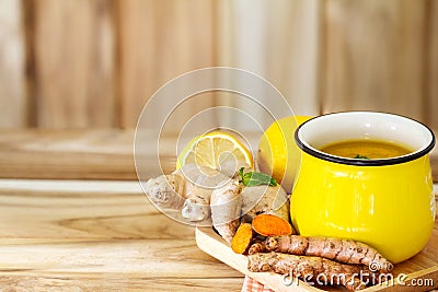 a cup of Turmeric Tea with lemon and ginger , Benefits for reduce Inflammation , Liver Detox and Cleanser healthy herb drink Stock Photo