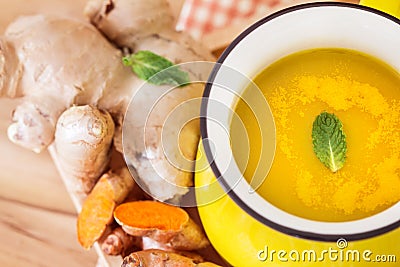 a cup of Turmeric Tea with lemon and ginger , Benefits for Stock Photo