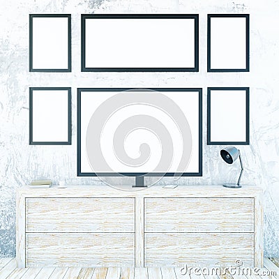 Cupboard with monitor and frames Stock Photo