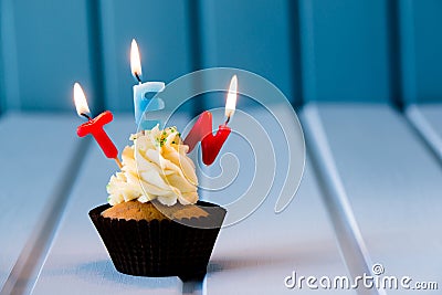 Cupcake with a candles for 10 - tenth birthday Stock Photo