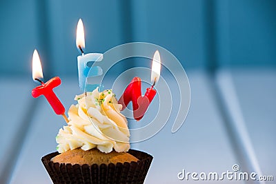 Cupcake with a candles for 10 - tenth birthday Stock Photo