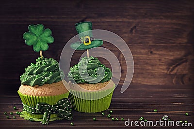 Cupcake with clover cakepick Stock Photo