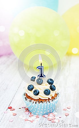 Cupcake with a numeral one candle Stock Photo