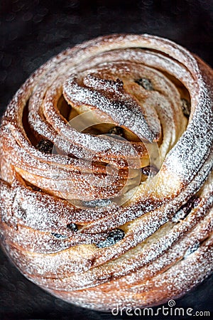 Cupcake pie crunch in the form of a roll sprinkled with powdered Stock Photo