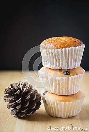 Cupcake on wood and black background Stock Photo