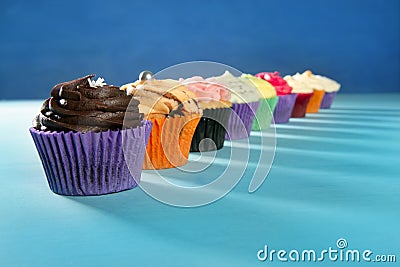 Cupcakes colorful cream muffin arrangement Stock Photo