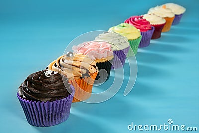 Cupcakes colorful cream muffin arrangement Stock Photo