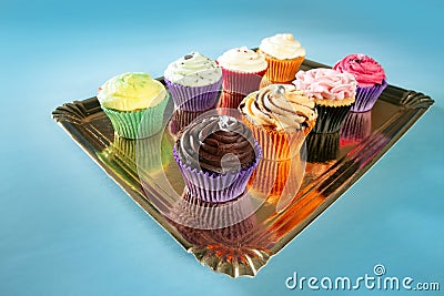 Cupcakes colorful cream muffin arrangement Stock Photo