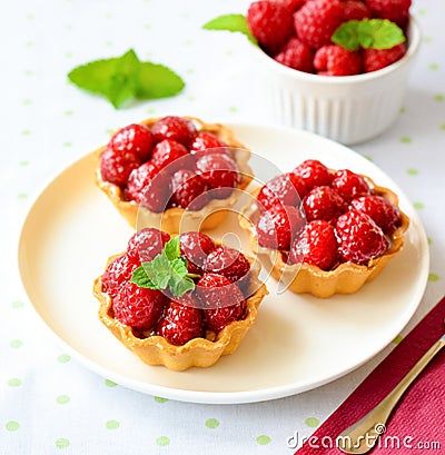 Cupcakes with raspberries Stock Photo