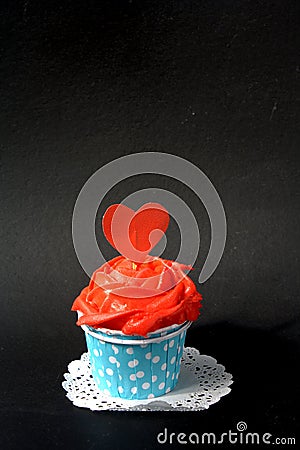 Cupcakes with red butter cream Stock Photo