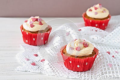 Cupcakes with sugar hearts Stock Photo