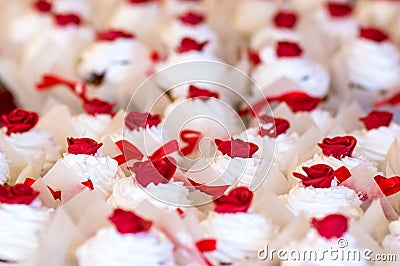 Cupcakes. White with red flowers Stock Photo